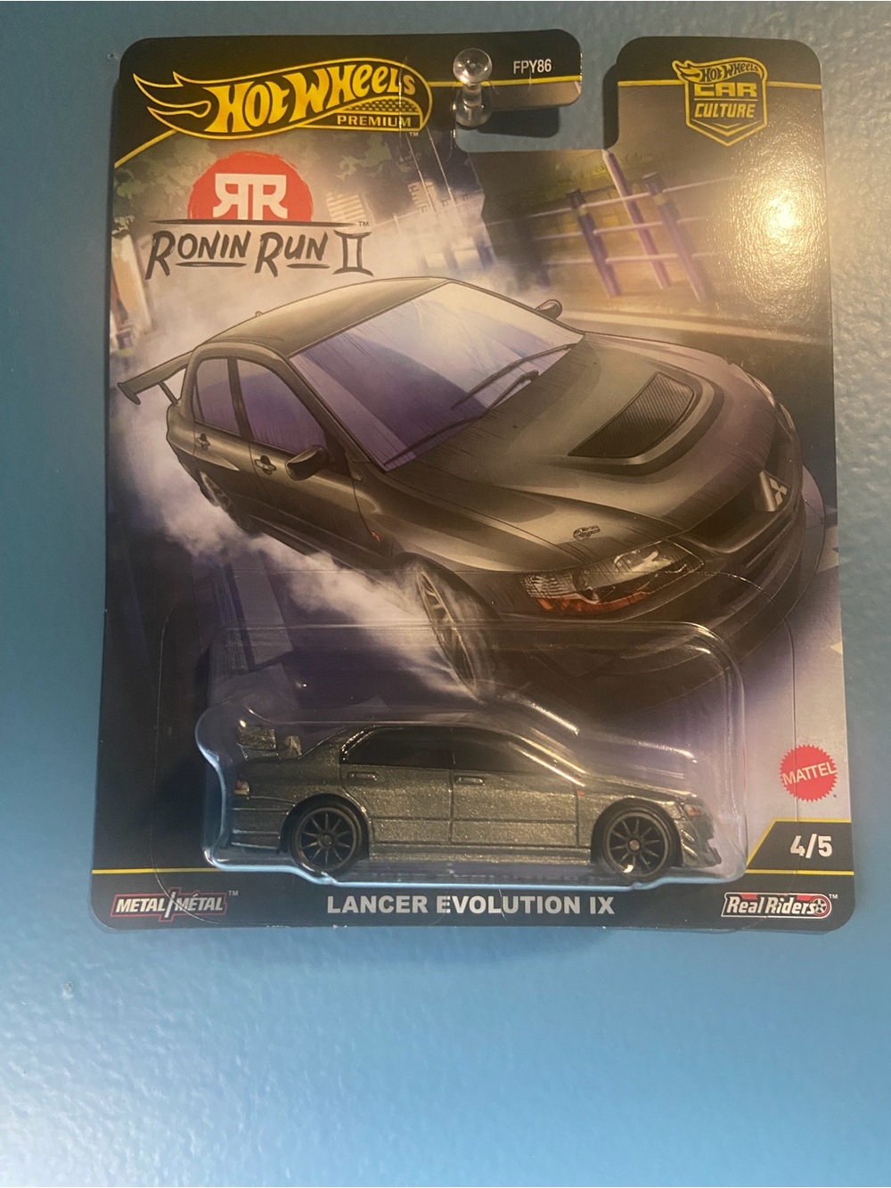 Hot Wheels Ronin Run II Lancer Evolution IX Toy Car - Metallic Gray